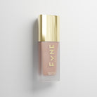Glass skin tint product with gold cap and 'FYNE' branding on a light gray background